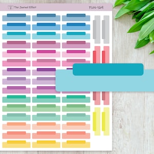 May include: A sheet of colorful rectangular stickers with rounded corners. The stickers are arranged in rows and columns. The stickers are in various shades of blue, teal, pink, purple, green, yellow, and orange. The text "FUN-169" is printed in the top right corner of the sheet.