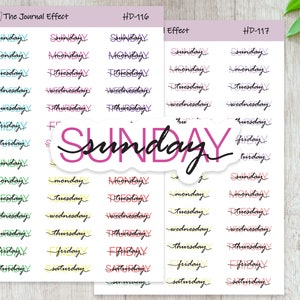 May include: Two sheets of planner stickers with days of the week in various colors. The stickers include the days of the week in a handwritten font. The text "SUNDAY" is in a larger, pink font. The top left corner of the sheet reads "The Journal Effect" and "HD-116".