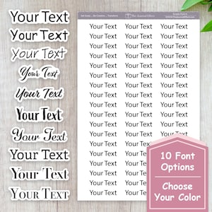 May include: A sheet of white sticker paper with 10 different font styles of the text "Your Text". The sticker sheet has a pink rectangle at the bottom with the text "10 Font Options Choose Your Color".