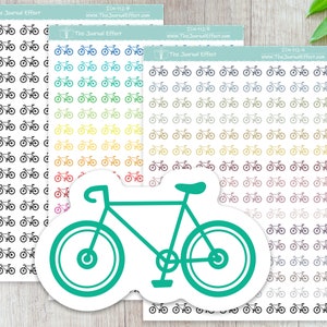 May include: Four sheets of stickers with a repeating pattern of bicycle icons in various colors. The stickers are on a white background. A large, teal-colored sticker of a bicycle is in the foreground.