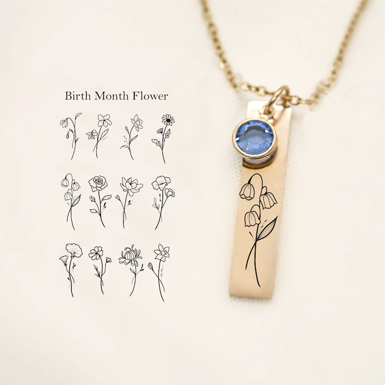 Gold birth flower necklace with custom birthstone. Features an engraved floral design representing birth month flowers. A unique and personalized jewelry piece, perfect for mothers, grandmothers, or loved ones. Ideal for birthdays, anniversaries, or special occasions.