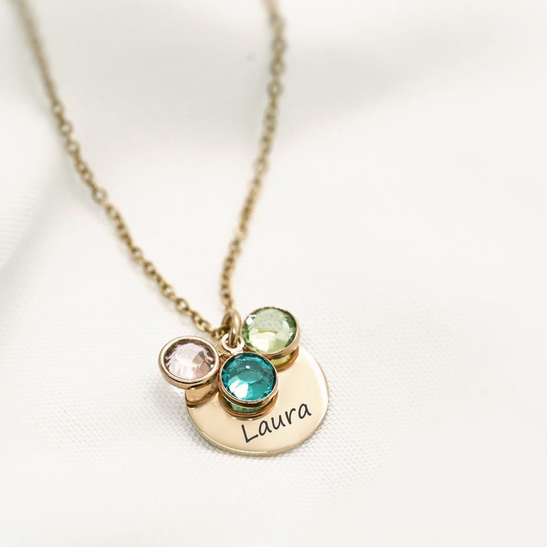 Gold initial necklace with personalized birthstones, featuring an engraved pendant and colorful gemstones. A meaningful and sentimental jewelry piece representing family and love. Perfect grandmother gift for birthdays, Mother’s Day, or Christmas.