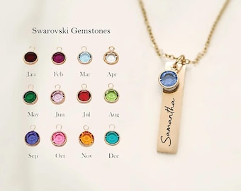 May include: A gold necklace featuring a personalised bar pendant engraved with the name "Samantha" and a light blue Swarovski crystal charm. The necklace comes with a choice of 12 different coloured Swarovski crystals representing each month of the year.