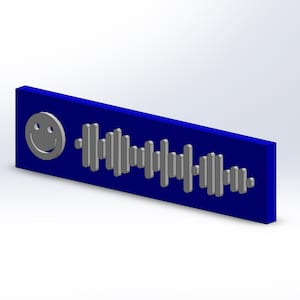 May include: A blue rectangular sticker with a gray smiley face and a gray barcode. The sticker is a Spotify code.