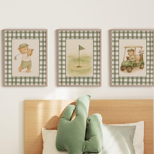 Set of three nursery prints featuring a teddy bear golfer, golf flag, and golf cart on green gingham backgrounds for playroom decor
