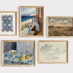 May include: Five framed paintings on a white wall. The paintings are in various styles and depict different scenes, including a floral pattern, a seascape with two women, a landscape with a cloudy sky, a still life with lemons and a bowl of fruit, and a sky with clouds.