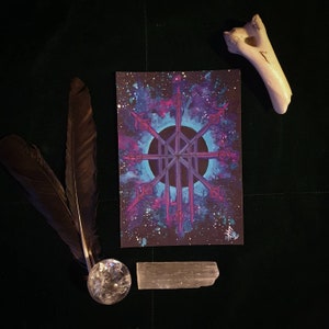 May include: A purple and blue watercolor painting of a starburst with a black circle in the center. The starburst has a pink outline and is surrounded by a galaxy-like background.