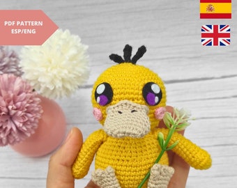 Patron en pdf descargable para tejer un amigurumi Psyduck en crochet. Tutorial paso a paso muñeco pokemon crochet.