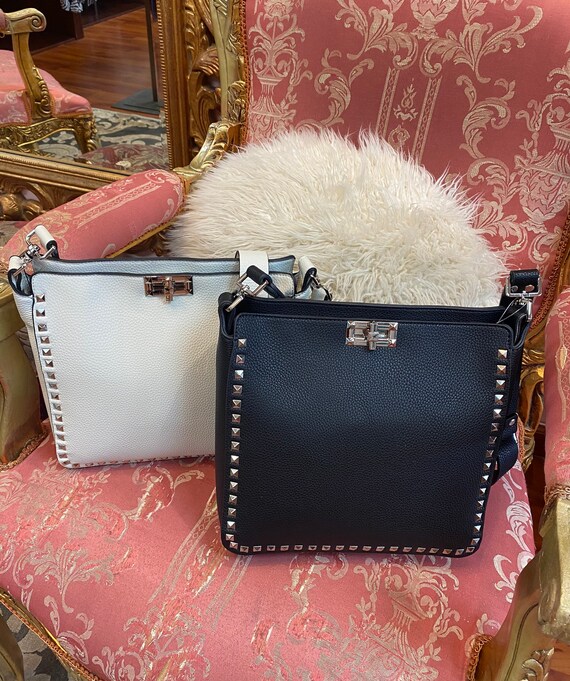 gold studded handbag