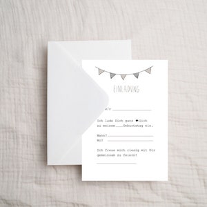 May include: A white card with a black and gray bunting at the top. The text "EINLADUNG" is written in black below the bunting. The text "Ich lade Dich ganz herzlich zu meinem Geburtstag ein." is written in black below the text "EINLADUNG". The text "Wann?" and "Wo?" are written in black below the text "Geburtstag ein.". The text "Ich freue mich riesig mit Dir gemeinsam zu feiern!" is written in black below the text "Wo?"