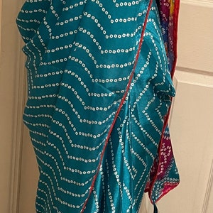 Bandhni print saree (saree actual colour is lighter not so dark and deep )1778