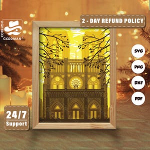 May include: A framed print of Notre Dame Cathedral in a warm yellow and brown color palette. The artwork features a stylized illustration of the cathedral with intricate details, framed by tree branches. The frame is made of light-colored wood. The image includes the text "2-DAY REFUND POLICY" and "24/7 SUPPORT".