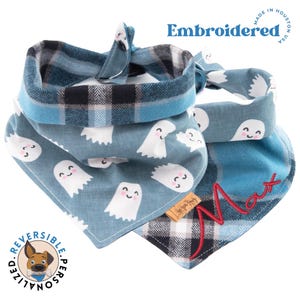a dog bandana with ghost faces on it