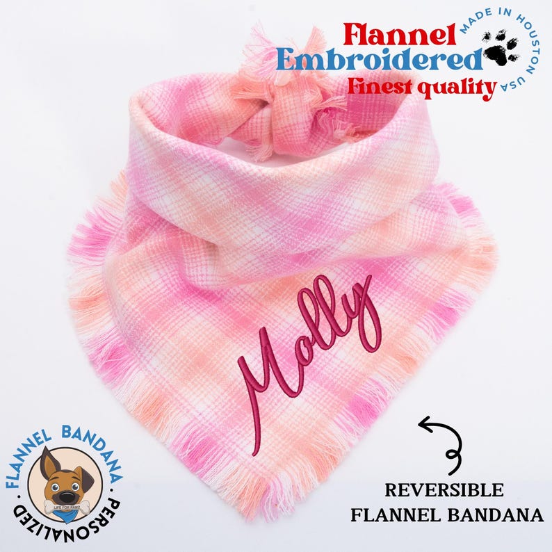 a pink and white scarf with a name on it