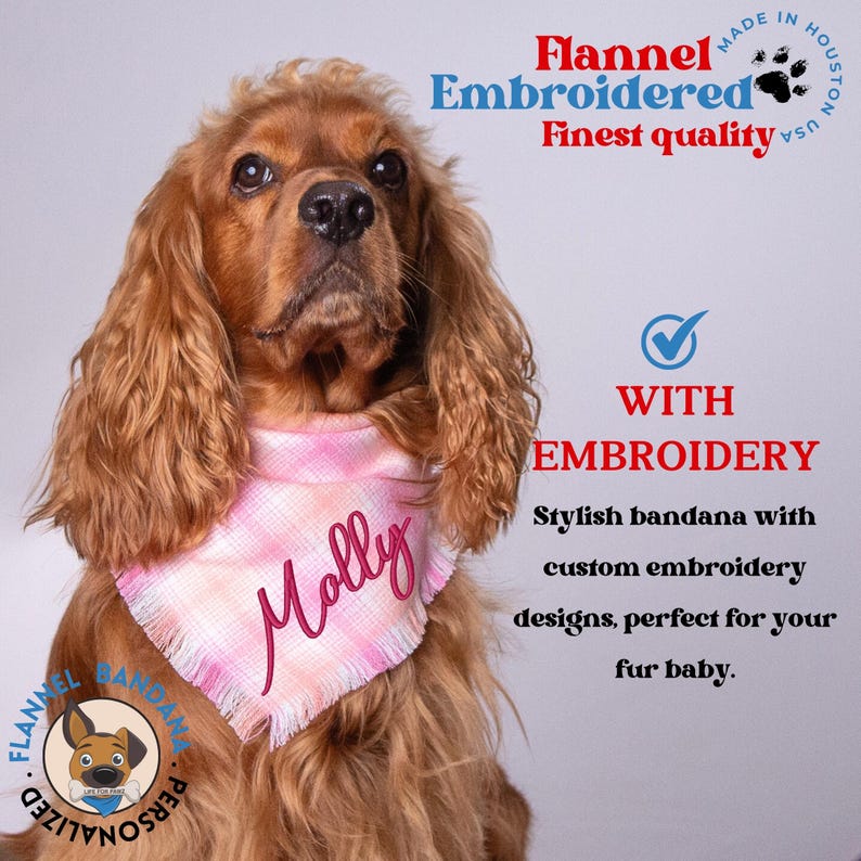 a brown dog wearing a pink bib with a name on it