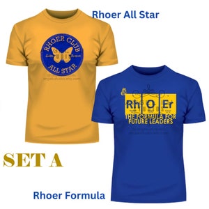 May include: Two short-sleeved t-shirts. One is gold with a blue and white circular design that says "Rhoer Club All Star". The other is blue with yellow text that says "Rho Er The Formula For Future Leaders". The text "SET A" is also visible.