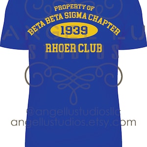 May include: Blue t-shirt with yellow text that reads "Property of Beta Beta Sigma Chapter 1939 Rhoer Club".