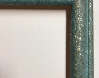 Light Turquoise Frame with Gold Flecks  for a painting or photo 9” x 12” Custom sizes available. Twenty-nine dollars.