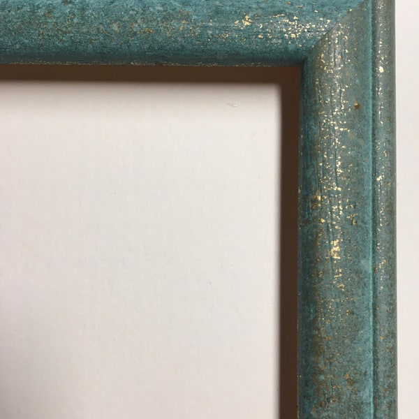 Light Turquoise Frame with Gold Flecks  for a painting or photo 6” x 6”. Custom sizes available. Twenty- eight dollars each.