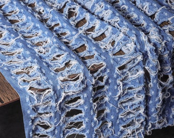 Blauwe denimstof, gescheurde denimstof, gescheurde denimstof, noodlijdende stof, holle denimstof, designerstof, D515-2