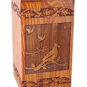 Solid Rosewood Cremation Urn with an engraved Cardinal