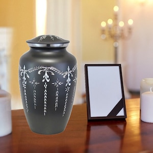 Delicate Silver Cremation Urn