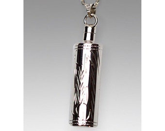 May include: Silver pendant necklace with a cylindrical urn. The urn has a decorative engraved pattern.