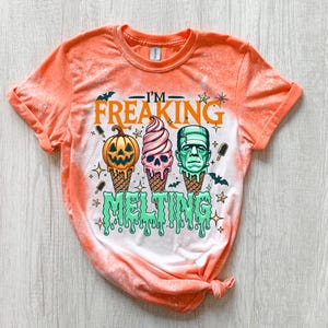 Handmade Summerween shirt featuring a funny spooky ice cream monster design, perfect for women who love Halloween vibes, horror-inspired tees, and cute spooky summer outfits.