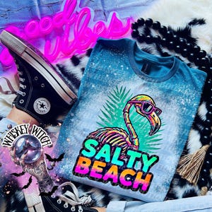 Salty Beach Shirt, Skeleton Flamingo Tee, Spooky Summer Graphic T-Shirt, Beach Goth Handmade Top Galapagos Blue