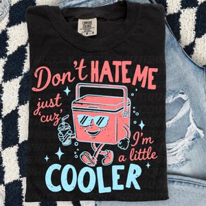 Don’t Hate Me, I’m Cooler
Comfort Colors 1717 Tee
Multiple Shirt Colors Available
Funny Summer Graphic Tee
Lake Day + Boat Day Ready
Perfect for Camping Trips
Cute Gift for Summer Girls