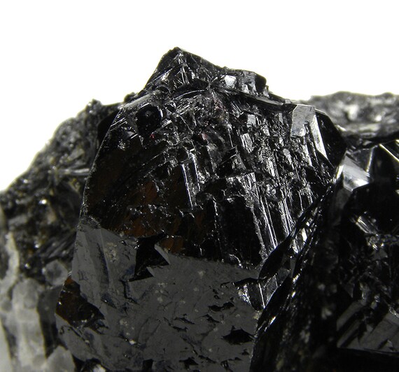 Cassiterite (“drillbit” twins) / Locality - Huanuni mine, Huanuni, Dalence Province, Oruro Department, Bolivia