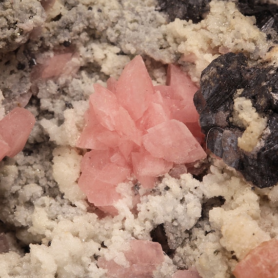 Rhodochrosite on Quartz with Sphalerite / Locality - Champion Mine, near Lake City, Cinnamon Pass, Park District, Hinsdale County, Colorado