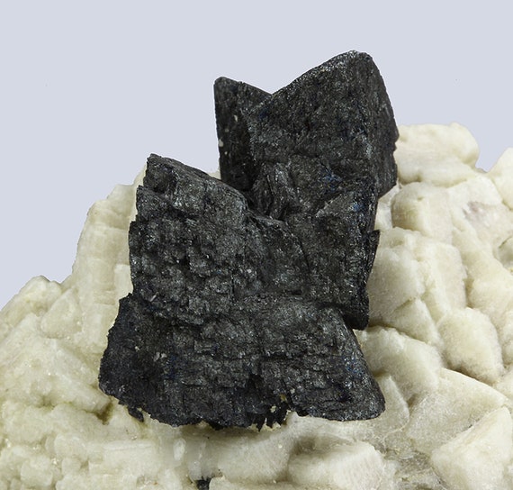 Hematite /(pseudomorph after Siderite) /on Microcline with Fluorite / Locality: R. A. Kosnar Yucca Hill Claim, Park County, Colorado