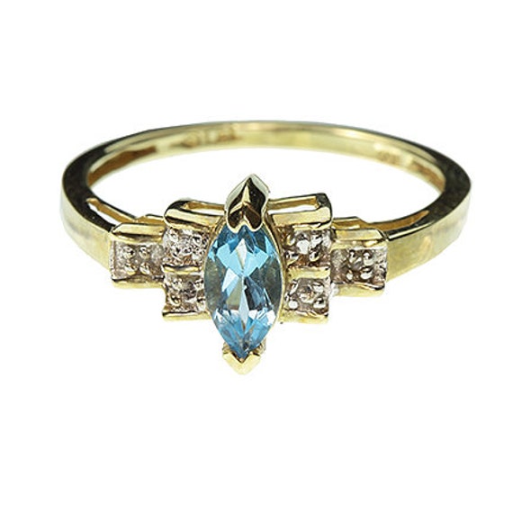 London Blue Topaz (0.65 cts) and Diamond Ring in 10kt Yellow Gold / Size: Ladies 6.5