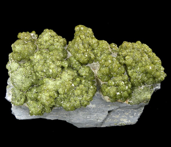 Andradite / (var - Demantoid) / Locality - Sferlun Mine, Val Malenco, Sondrio, Lombardia, Italy