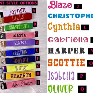 May include: A collection of fabric keychains with metal rings, each embroidered with names like Jordyn, Lilly, Sebastian, Kayla, Yani, Kristian, Aniyah, Winter, Khamron, and Mrs. Plaster. The right side displays font style options labeled J through Q.