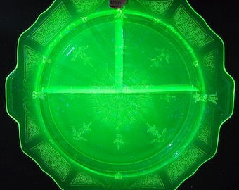 May include: A bright green, octagonal divided serving dish. The dish has a decorative embossed pattern around the rim and in the center. The dish is divided into three sections and has a small tag that says "FANCY".