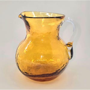 Vintage Amber Glass Pitcher With Clear Handle & Textured Design