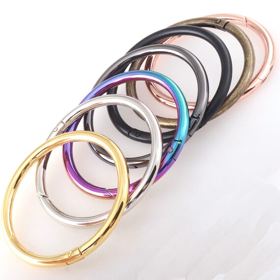 Heart Shape Spring Gate O Ring Karabiner 5er Set – Gun Black Taschenverschluss 22mm Innenweite Heart Shape Spring Gate O Ring Karabiner 5er Set – Gun Black Taschenverschluss 22mm Innenweite