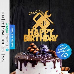 Könnte beinhalten: Goldener Glitzer-Kuchentopper mit einem Schraubenschlüssel und einem Schraubendreher sowie den Worten "Happy Birthday".