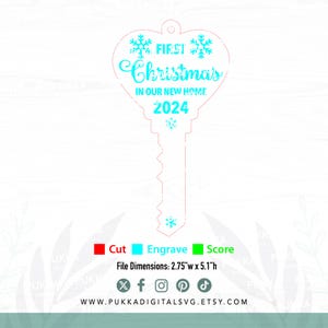 May include: A blue and white key-shaped ornament with the text "FIRST Christmas IN OUR NEW HOME 2024" and snowflakes. The ornament is designed for cutting, engraving, and scoring.