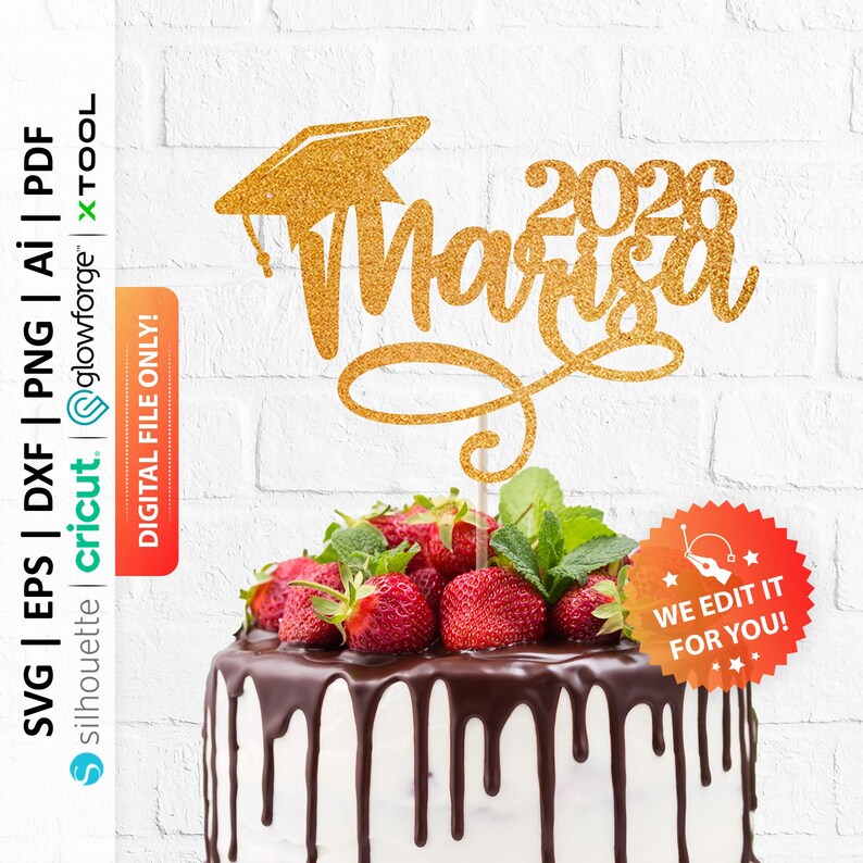 May include: A gold glitter cake topper with the name "Marisa" and the year "2026" in a script font, topped with a graduation cap. The cake is decorated with strawberries and chocolate ganache.