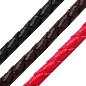 May include: Three strands of braided leather cord in black, brown, and red.