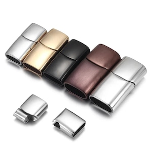 May include: An assortment of magnetic clasps in silver, gold, black, and bronze finishes. These oval-shaped clasps are suitable for jewellery making. Two additional clasps are shown separately. Measurements are in centimetres.