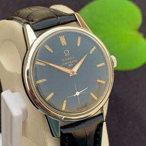 Vintage Omega Seamaster Vintage Automatic English made Dennison Stainless case for Omega.With black lizard grain
