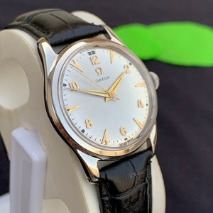 Vintage Omega, Automatic Winding  English made Dennison Stainless case for Omega leather Strap
