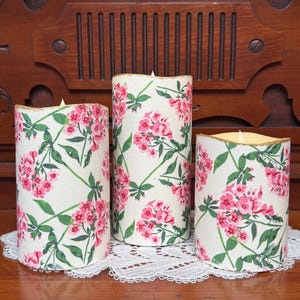 Pink Floral Flameless Candle Set: LED Flickering candle, LED decorative candle, batteries & remote included, 3&quot;W x 3&quot;/4&quot;/5&quot;H, set of 3