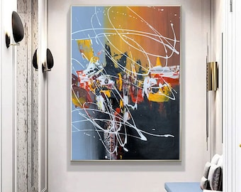 May include: Abstract painting with bold strokes of yellow, red, orange, white, and black paint. The painting features a dynamic composition with swirling lines and shapes.