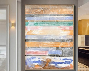 Puede incluir: Pintura abstracta con rayas horizontales en tonos de marrón, azul, verde, rosa y gris. La pintura tiene un aspecto texturizado y en capas.