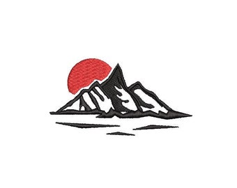 May include: Embroidered mountain range design with a red sun rising behind the peaks. The mountains are black with white accents, set against a white background. The design is likely for apparel or home decor.